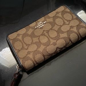 Coach brown wallet.